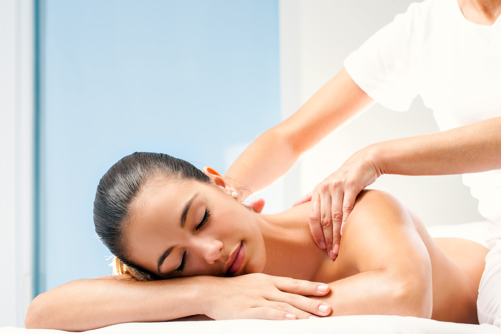 woman-getting-a-massage-relaxed-pamper